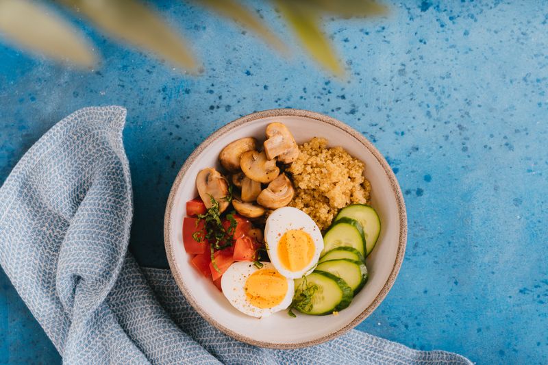 Quinoa Power Bowl with roasted vegetables and hummus