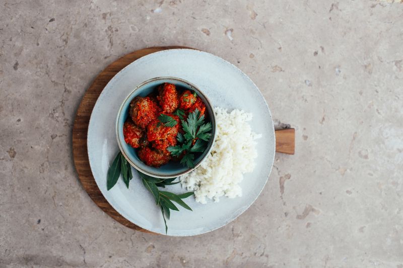 Greek Farro Bowl with lamb meatballs and tzatziki